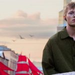 Шёл по улице фотограф